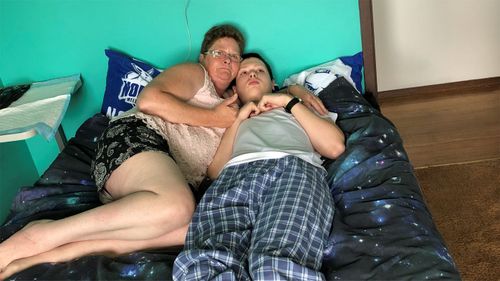 Ben Doney and his mother Bridget at their home in Howra, Tasmania.