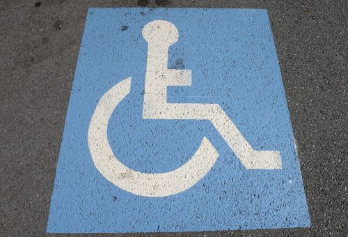 Queenslanders who park in disabled car spaces could soon find themselves slapped with a demerit point penalty as well as cash fine. 