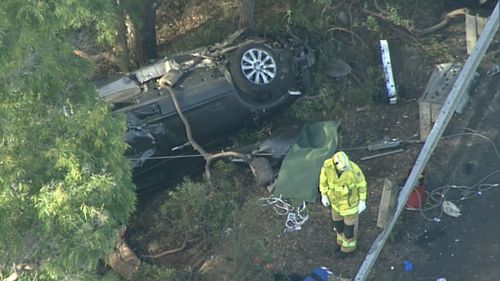 The two children and a second woman had to be freed from the wreckage. (9NEWS)