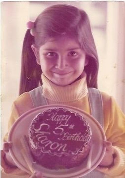 The five-year-old holding her birthday cake at her family's farm in Neerim, South Gippsland, Victoria, in 1976.