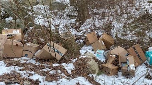 Dozens of abandoned, damaged Amazon packages found in woods