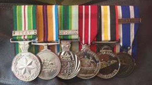 Jay Deeming's medals were returned today more nearly two months after being stolen. (9NEWS)