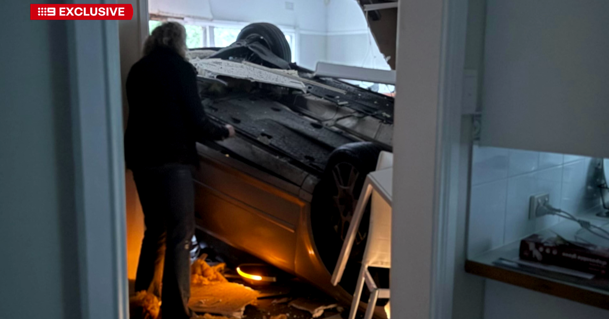 Aged care worker dodges disaster when car ploughs into living room