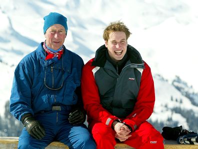 Prince Charles poses with son Prince William in the Swiss village of Klosters at the start of their annual skiing holiday in the Swiss Alps on March 28, 2004 in Switzerland. 