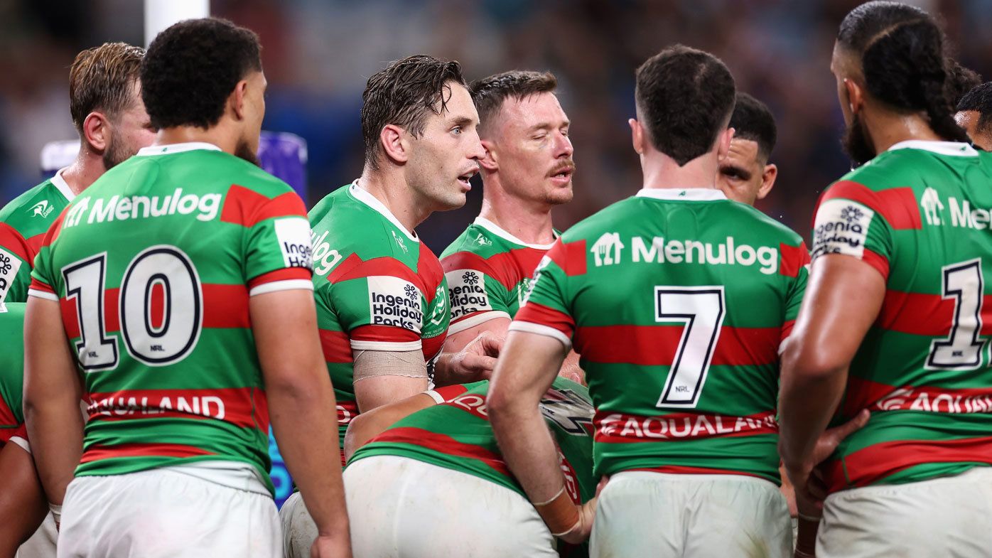 Rabbitohs players come together after conceding a try.