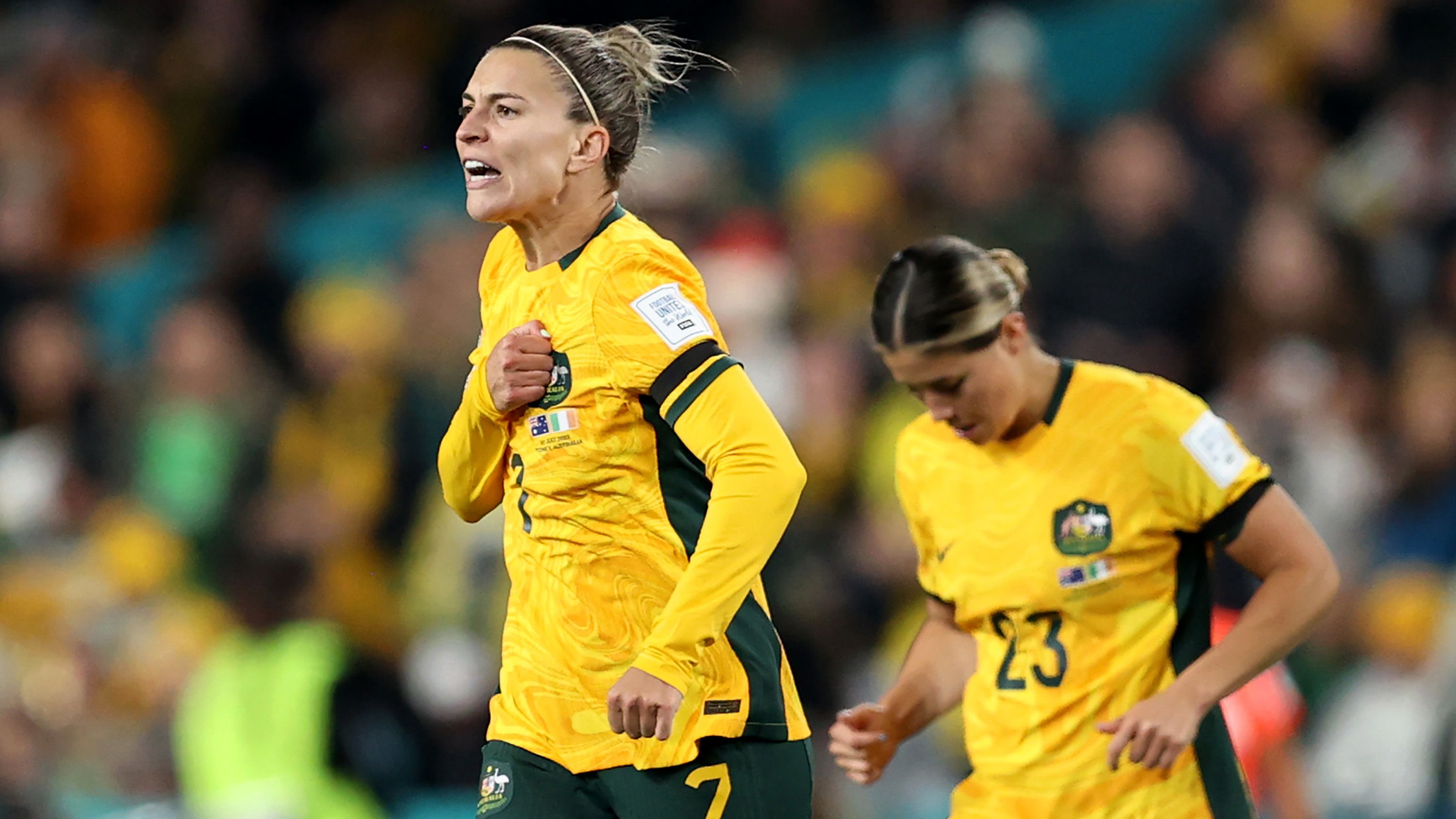 SYDNEY, AUSTRALIA - JULY 20: Steph Catley (L) of Australia celebrates after scoring her team&#x27;s first goal  during the FIFA Women&#x27;s World Cup Australia &amp; New Zealand 2023 Group B match between Australia and Ireland at Stadium Australia on July 20, 2023 in Sydney, Australia. (Photo by Brendon Thorne/Getty Images)