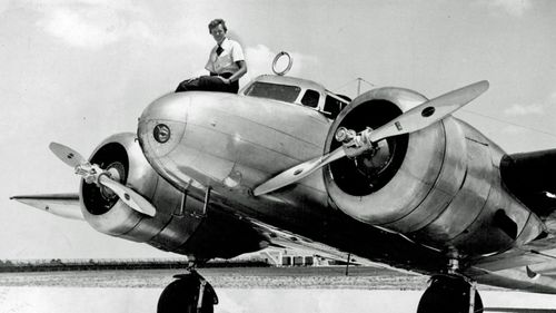  Amelia Earhart before takeoff in Miami for an attempted round-the-world flight. Earhart and her navigator, Fred Noonan, disappeared in the South Pacific in July 1937, while on one of the last legs of that journey. (AP).