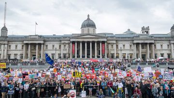 Anti-Trump protesters pack Trafalgar Square in London.