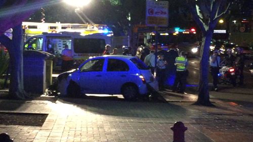 Car hits two pedestrians in Sydney, leaving one with critical head injuries