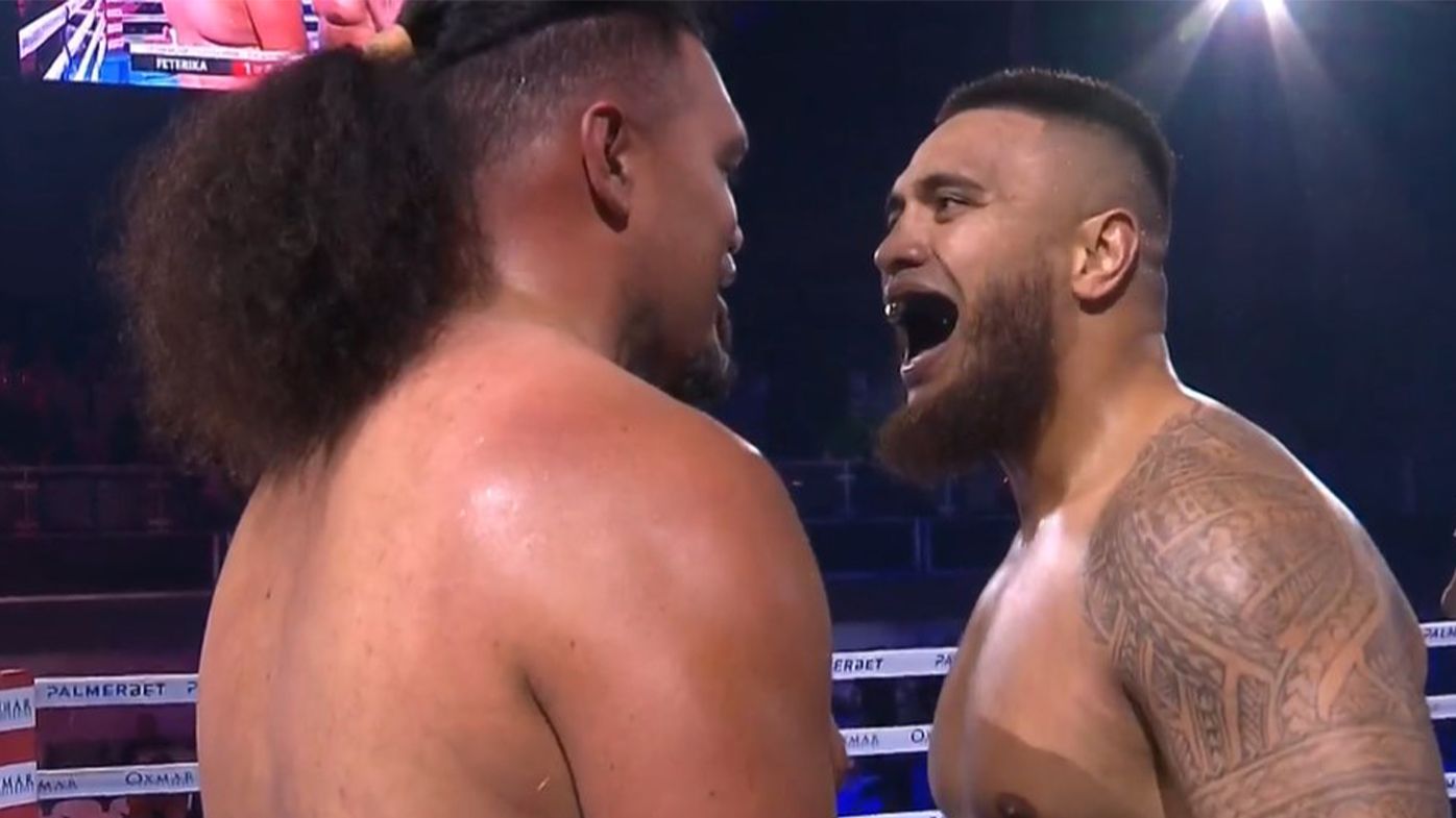 Sparks fly between Marvin Feterika and Toese Vousiutu after referee's TKO call