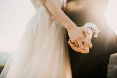 Bride and groom's hands