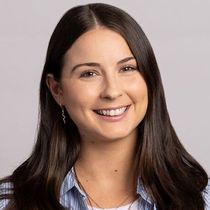 A distressed individual holding a Centrelink debt notice letter, symbolizing the fear and financial strain caused by the Robodebt scheme