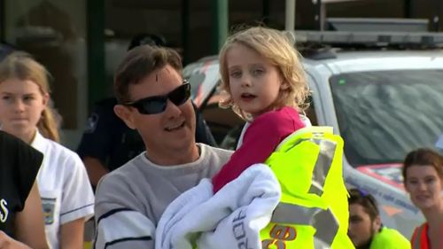 Jocelyn Lewis was reunited with her father, Steve, yesterday. (9NEWS)