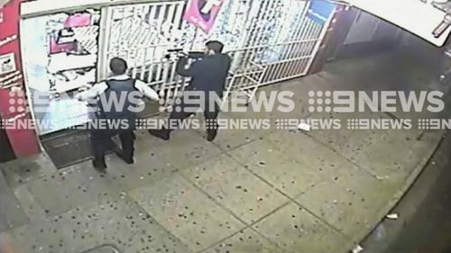 With guns drawn, police arrived and arrested the men. (9NEWS)