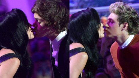 2012 MTV VMAs: One Direction's Harry wipes his mouth after Katy Perry kisses him and Niall on the lips