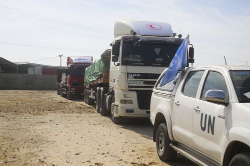 Trucks with humanitarian aid enter the Gaza Strip in Rafah on Saturday, Oct. 21, 2023.