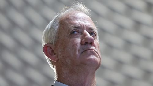 Benny Gantz attends a memorial ceremony for Israeli soldiers who fell in battle during the 2014 Gaza War, in the Hall of Remembrance at Mount Herzl Military Cemetery in Jerusalem on Tuesday, July 16, 2024.  (Abir Sultan/Pool Photo via AP)