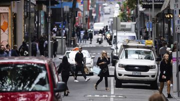 Pedestrians on Little Bourke Street in Melbourne