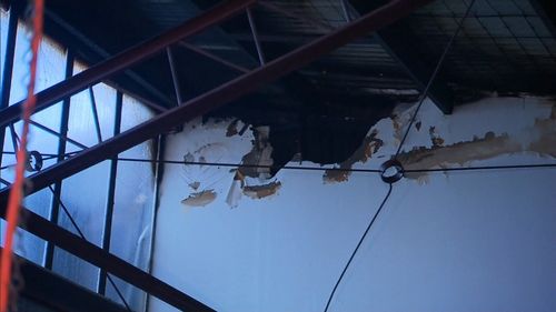 Damage from inside an adjacent building.