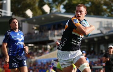 Charlie Cale of the Brumbies crosses for a try during the round one Super Rugby match.