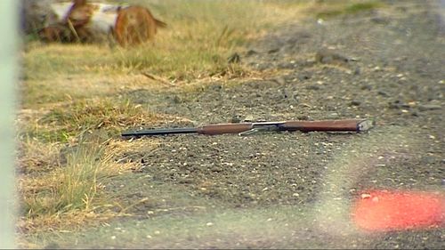 A rifle remains on the ground after the incident. Picture: 9NEWS