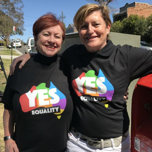 Liberal Party Councillor (And sister of Tony Abbott) Christine Forster and Partner Virginia Edwards, standing near a letterbox while attending a Same Sex Marriage "Yes" campaign event in Sydney.