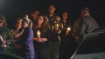 A vigil has been held for a brother and sister killed in a crash in Sydney.