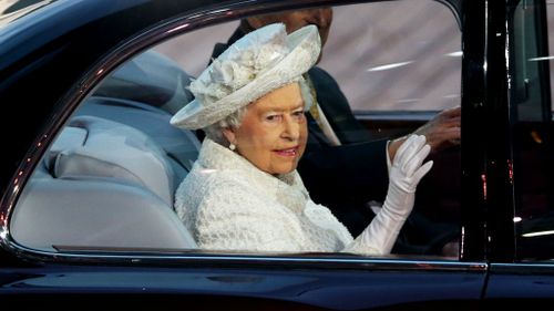 Queen Elizabeth II arrives to open the Commonwealth Games. (Getty)