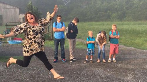 Mum jumps for joy in back-to-school photos