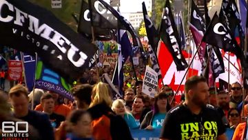 CFMEU union members marching at a rally in Melbourne.