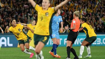 Sam Kerr celebrates after scoring an astonishing goal to level the score at 1-1 in the Matildas&#x27; World Cup semi final clash with England.