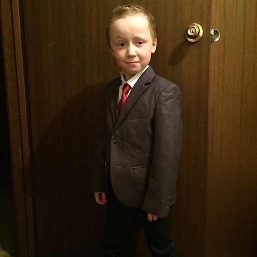 Seven-year-old Jack wearing his first suit. 