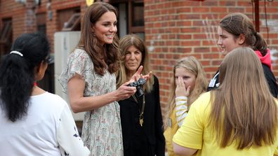 Catherine, Duchess of Cambridge at photography workshop for Action for Children, run by the Royal Photographic Society at Warren Park on June 25, 2019 in Kingston, England