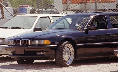 A black BMW, riddled with bullet holes, sits in a Las Vegas police impound lot in 1996.