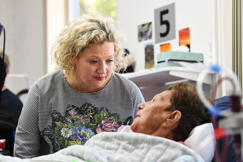 Health Minister Jill Hennessy  spoke to a patient at the hospital.