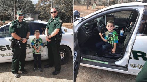 Police officers surprise boy who called 911 inviting them to Thanksgiving dinner