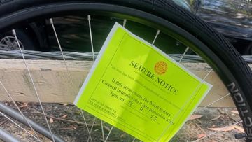 Seizure notice stuck on bike wheel near Folly Point by North Sydney Council.