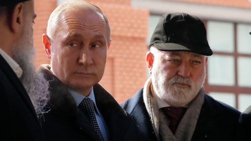 Viktor Vekselberg is pictured next to Russian President Vladimir Putin.
