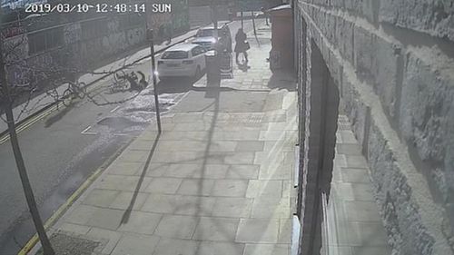 Police release CCTV footage of London cyclist being kicked off bike in Hackney.