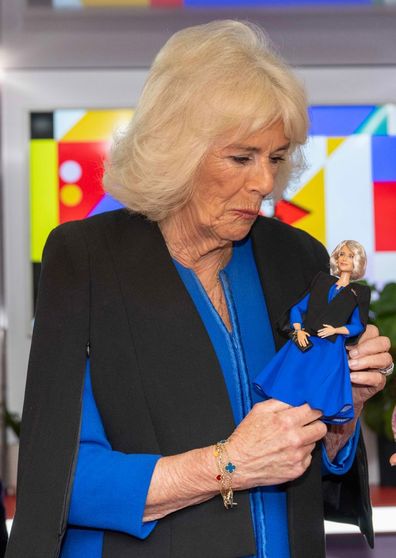 Her Majesty, Queen Camilla is presented with a Barbie in her likeness at Buckingham Palace on March 12, 2024 in London
