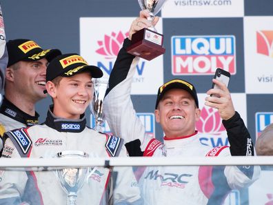 BATHURST, AUSTRALIA - FEBRUARY 04: Grant Denyer celebrates on the podium during the 2018 Bathurst 12 Hour Race at Mount Panorama on February 4, 2018 in Bathurst, Australia. (Photo by Daniel Kalisz/Getty Images)