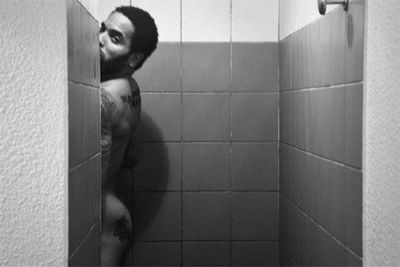 Lenny Kravitz tried to pass off this sneaky butt-snap as an intruder's handywork, tweeting: "Can't a guy take a shower in peace? Fair game. They got me." Well they may have snapped the pic, Lenny, but only you thought it was a smart idea to share the moment with four million followers!<br/><br/><i>Image: Twitter @lennykravitz</i>
