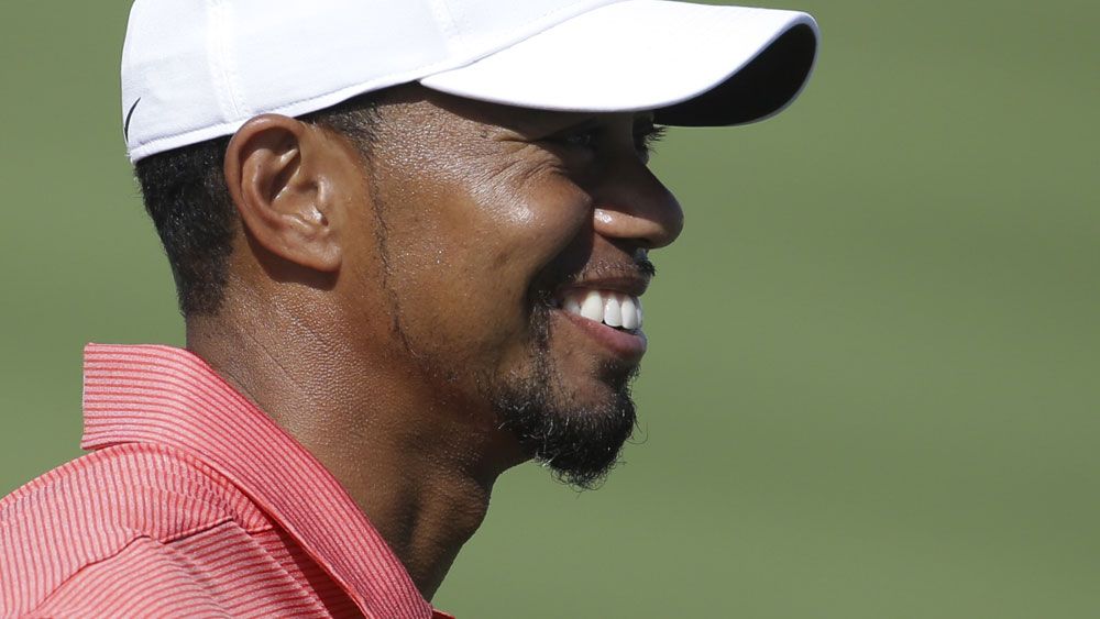 Returning Tiger soars with two eagles in pro-am
