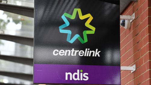 Man charged after allegedly coughing on Centrelink security guard 