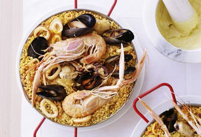 Seafood paella with alioli