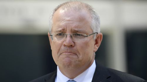 Scott Morrison says Australia won't have to follow the US in hiking interest rates in the near future. (AAP)