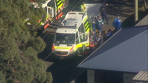 Paramedics work on site after early reports of a shooting in Engadine.