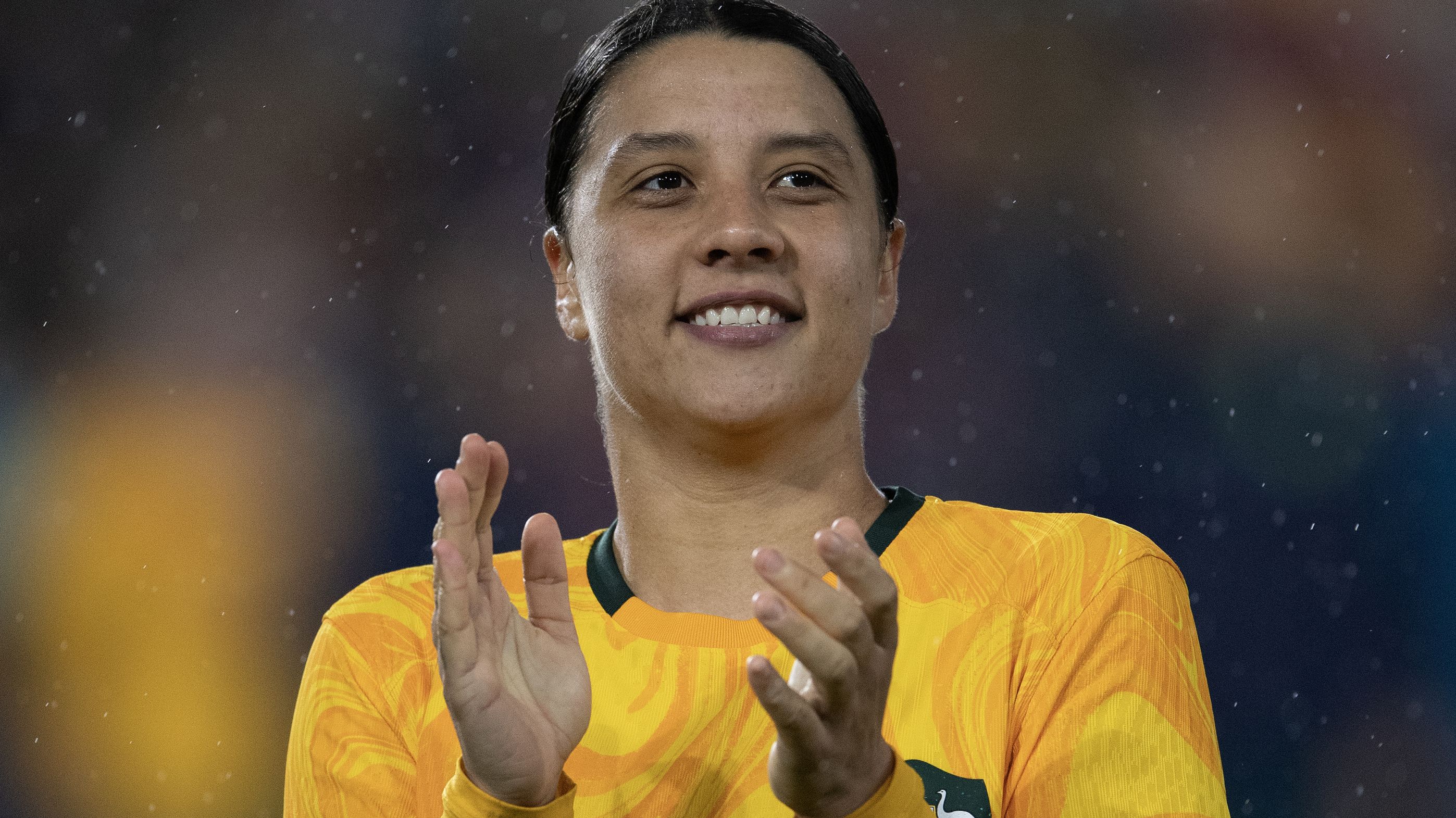 BRENTFORD, ENGLAND - APRIL 11:   Sam Kerr of Australia ackowledges the away fans after the Women&#x27;s International Friendly match between England and Australia at Gtech Community Stadium on April 11, 2023 in Brentford, England. (Photo by Visionhaus/Getty Images)
