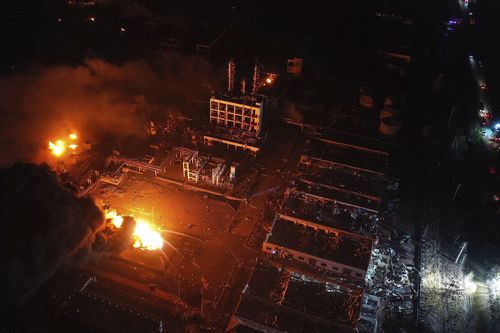 Fires burned at the site of a factory explosion in a chemical industrial park in Xiangshui County of Yancheng in eastern China's Jiangsu province well into the night. (Ji Chunpeng/Xinhua via AP)