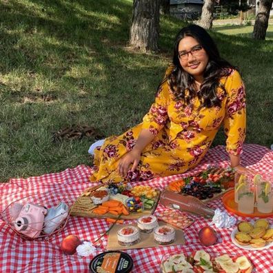 Naomi on a picnic rug